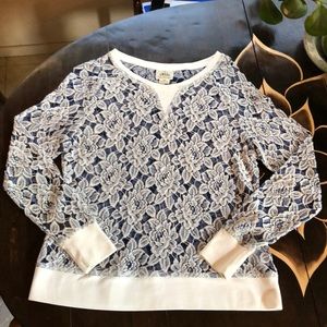 Ariat sheer rose pattern long sleeve.